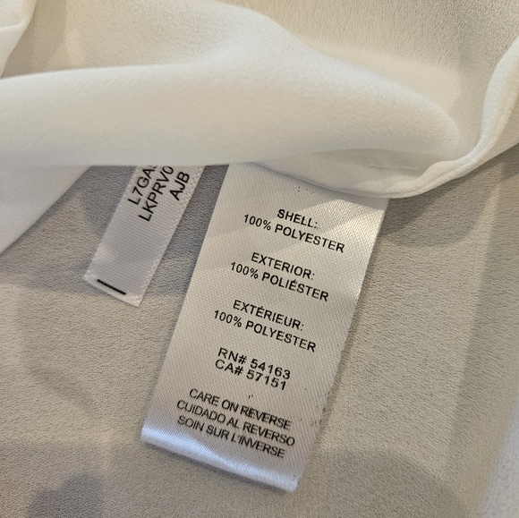 Ruffle accented, tie neck blouse - Picture 6 of 7